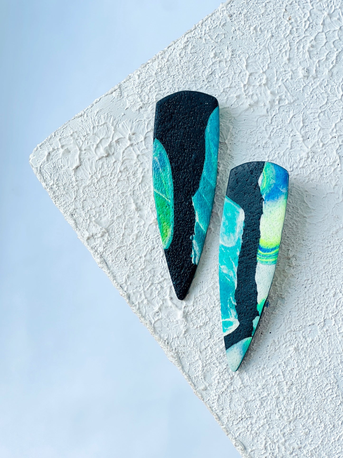 The Gemini in Marbled Cobalt, Green, + Black Polymer