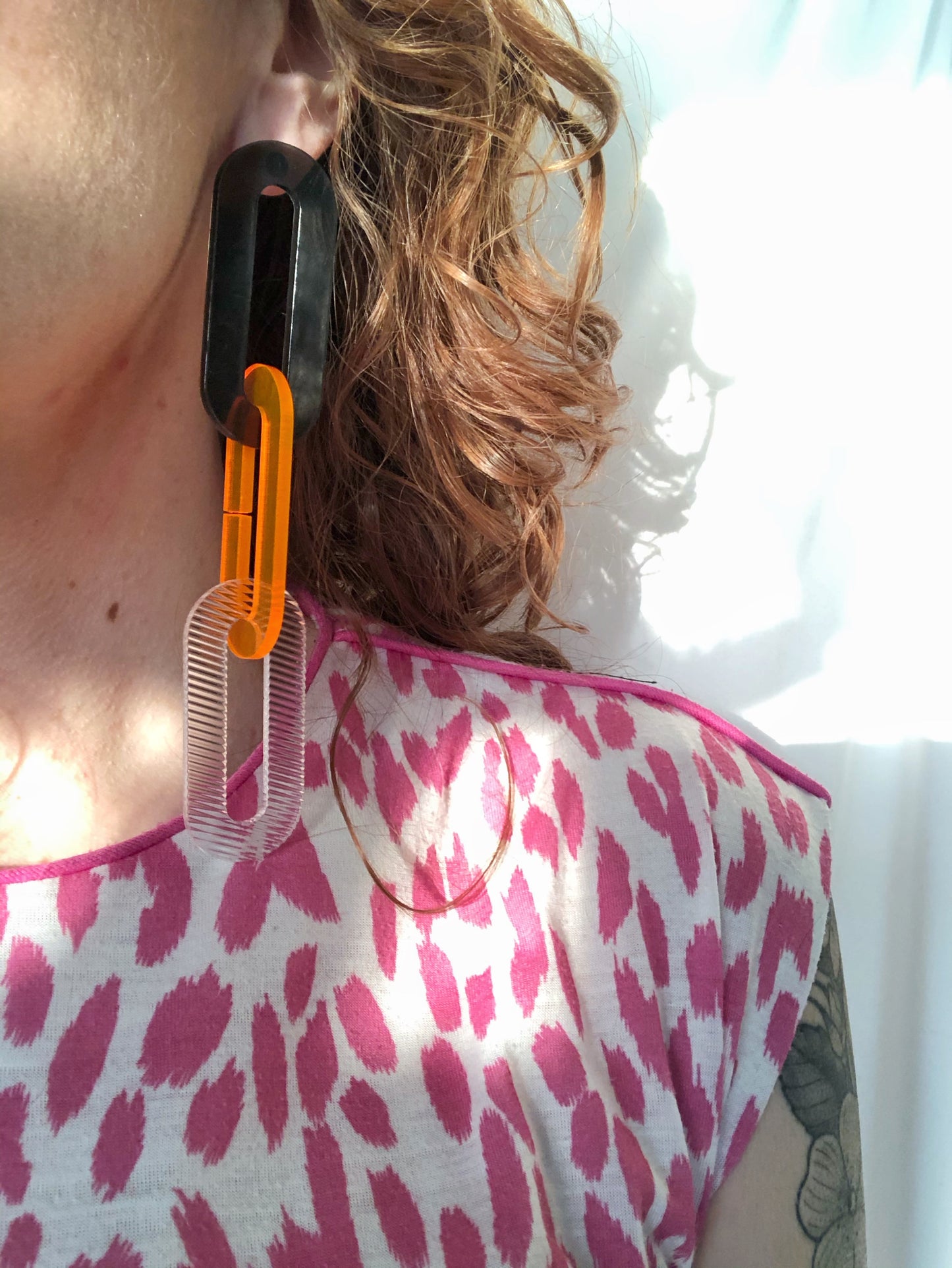 The Spano in Smoky Brown, Neon Orange, + Clear Ribbed Acrylic
