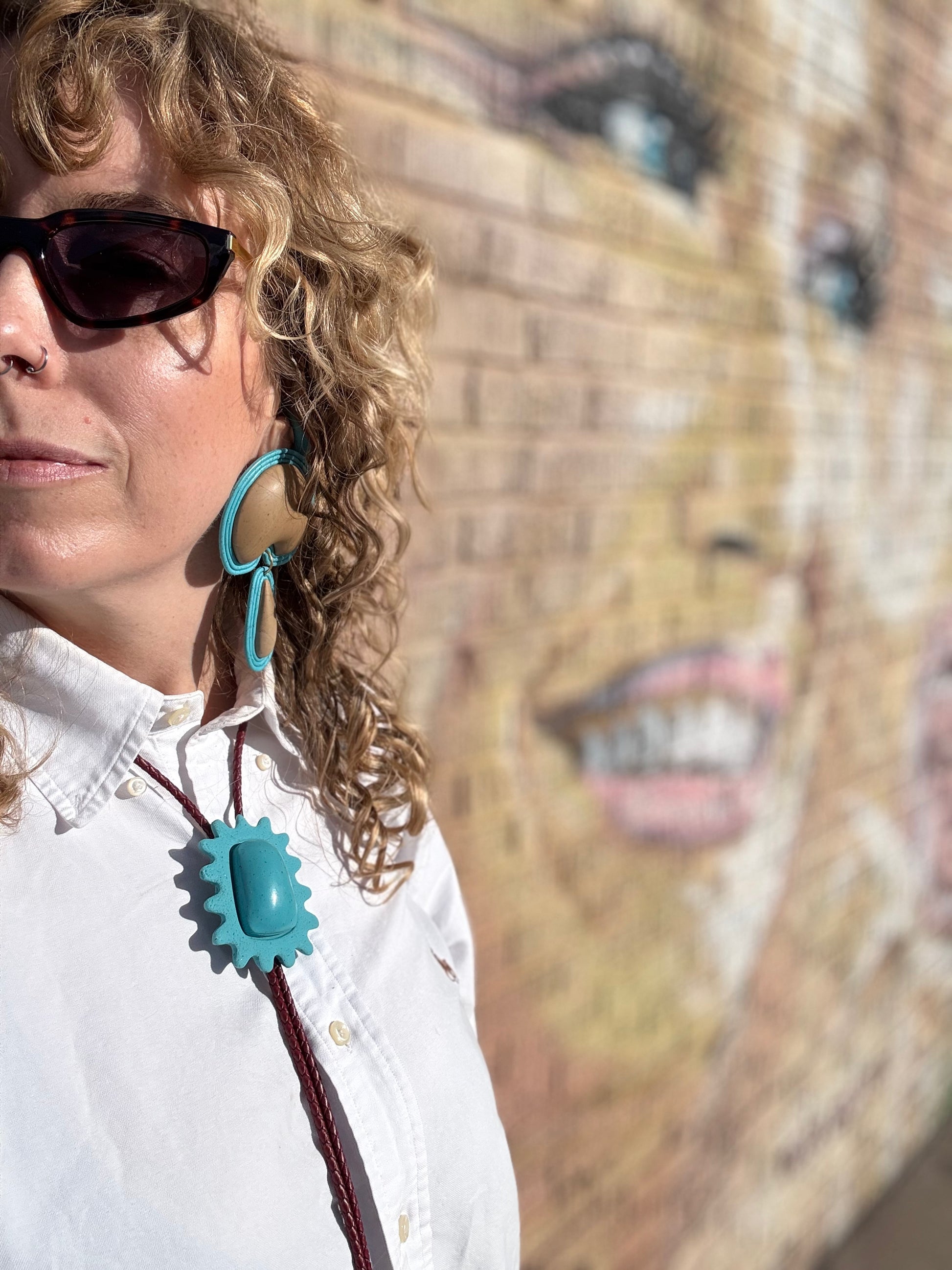The Squiggle Frame BOLO TIE  in Sky Blue Granite Polymer Clay