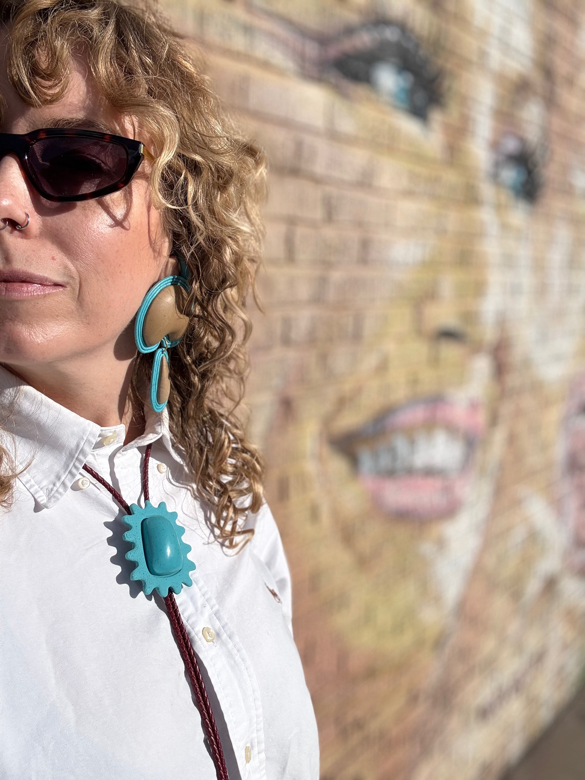 The Squiggle Frame BOLO TIE  in Sky Blue Granite Polymer Clay