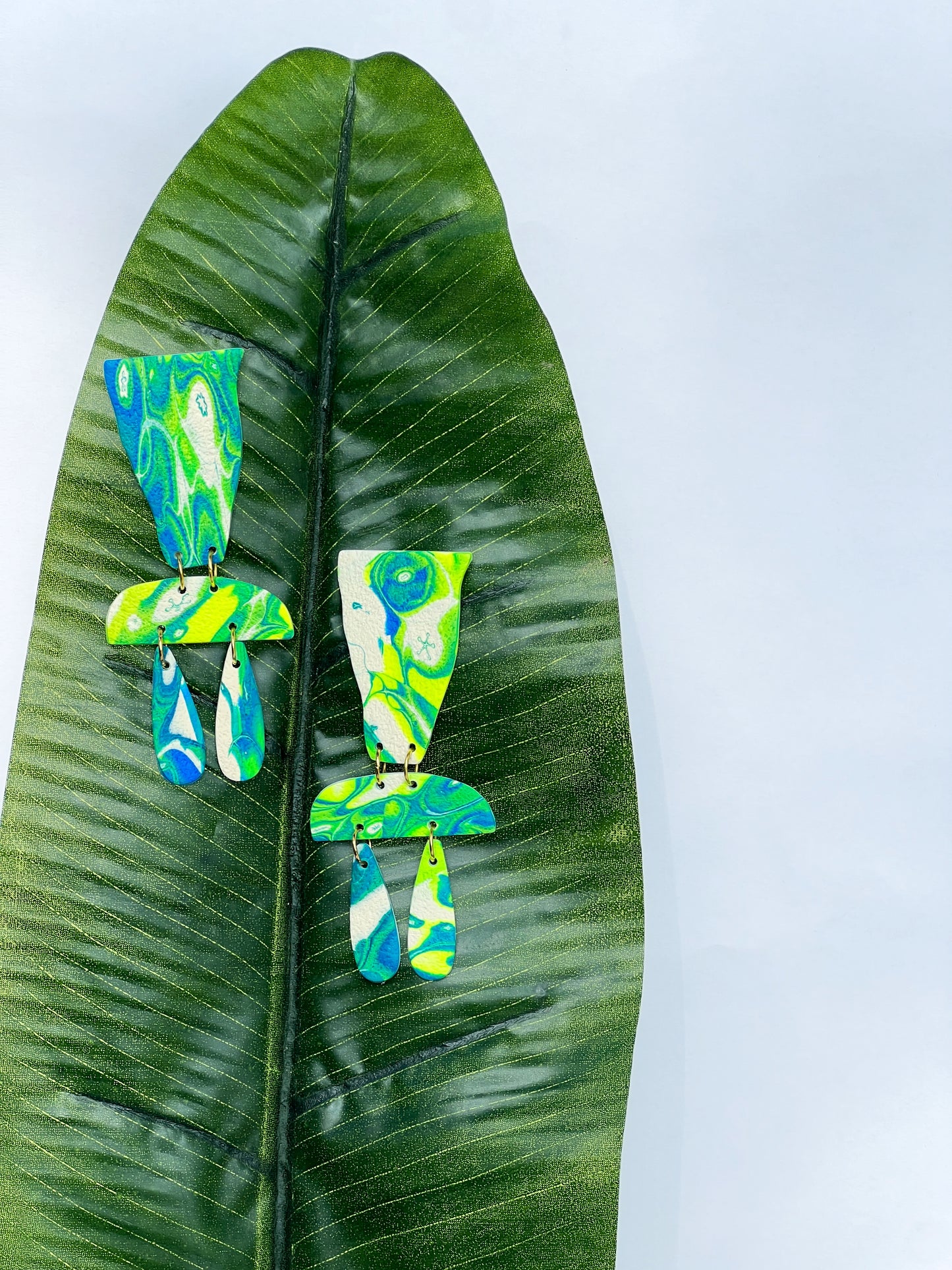 The Excla in Cobalt, Green, and Cream Polymer