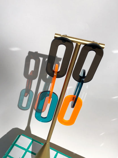 The Spano in Smoky Brown, Teal, + Neon Orange Acrylic