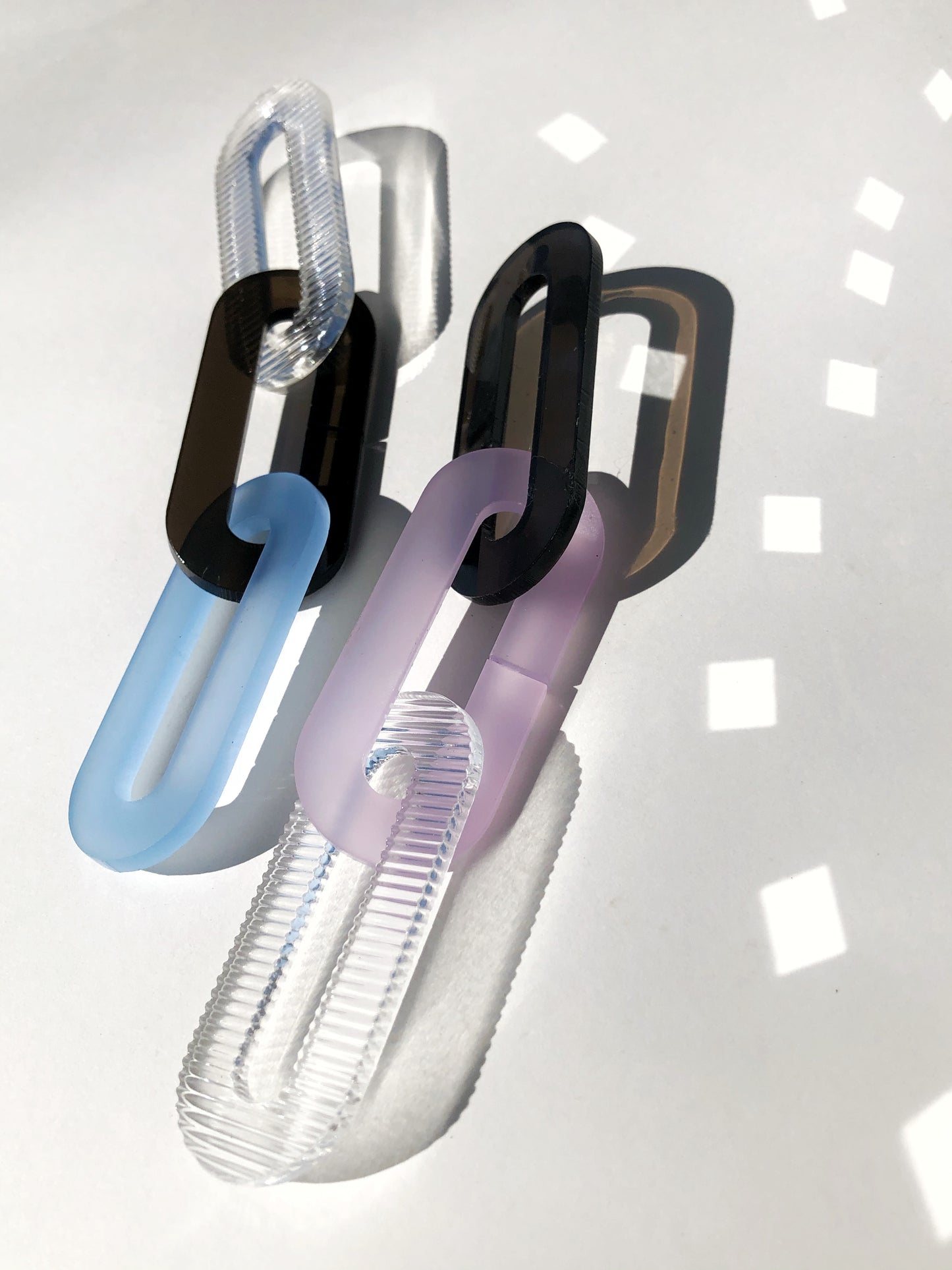 The Spano in Smoky Brown, Lavender, Baby Blue, + Clear Ribbed Acrylic